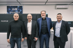 (from left to right) Alberto Agostini, Equipment Commercial Director, MCA, Mark Lawn, Head of Print-on-Demand Business, Fujifilm Europe, Massimo Spaggiari, Sales Director, MCA and Cristina Del Guasta, Director, MCA.